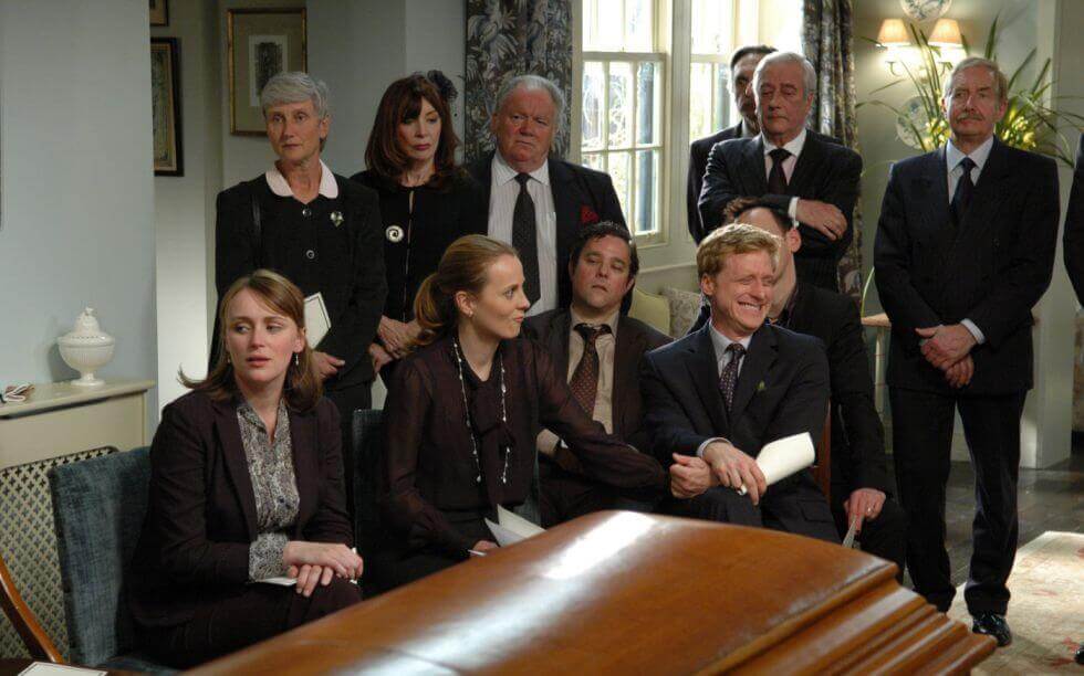 Personas en un funeral