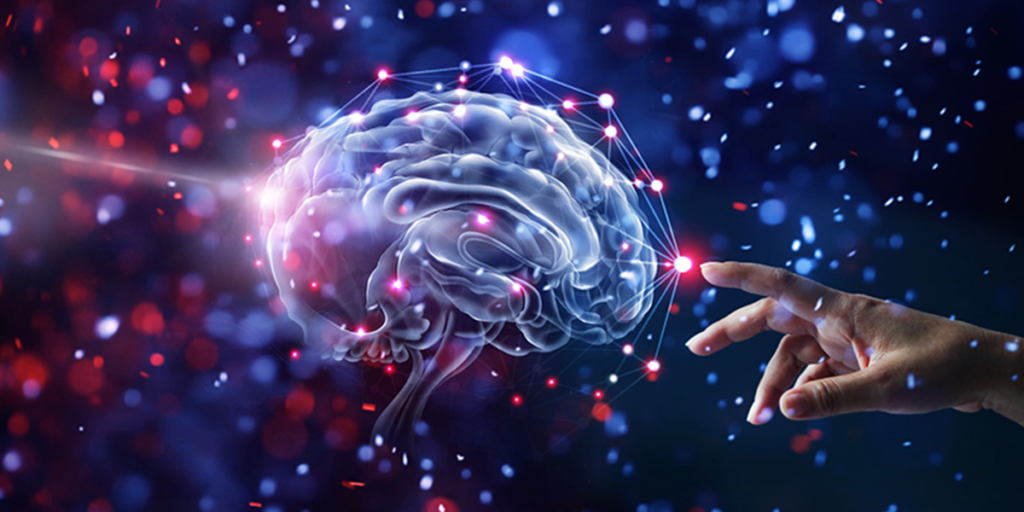 Mano tocando un cerebro