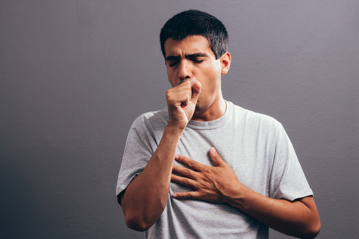 Man coughing