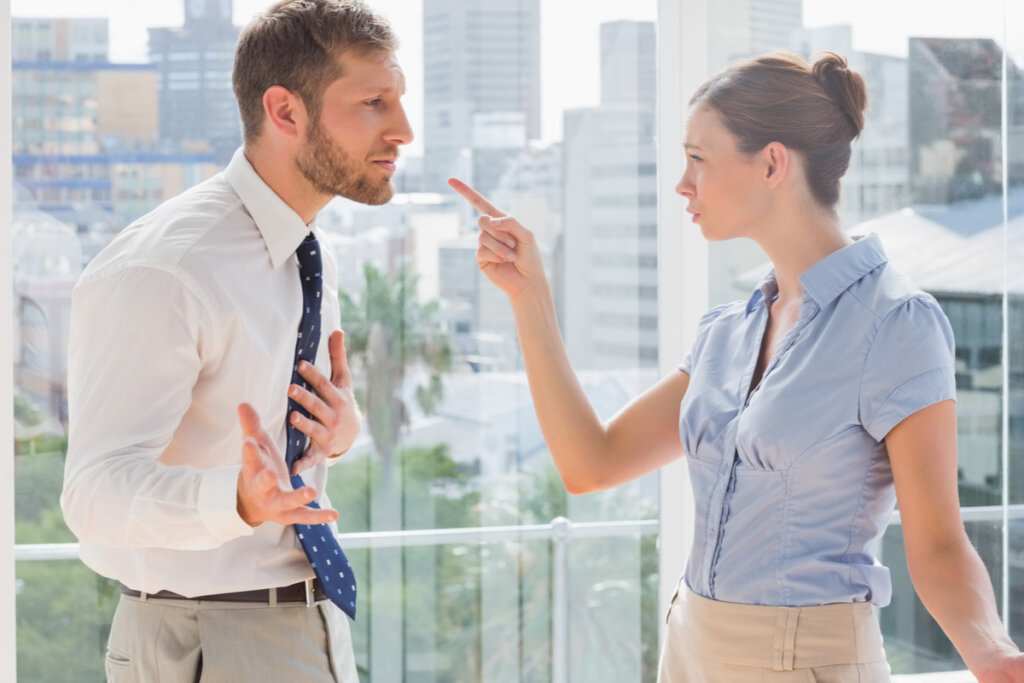 Couple arguing over gray stone metaphor