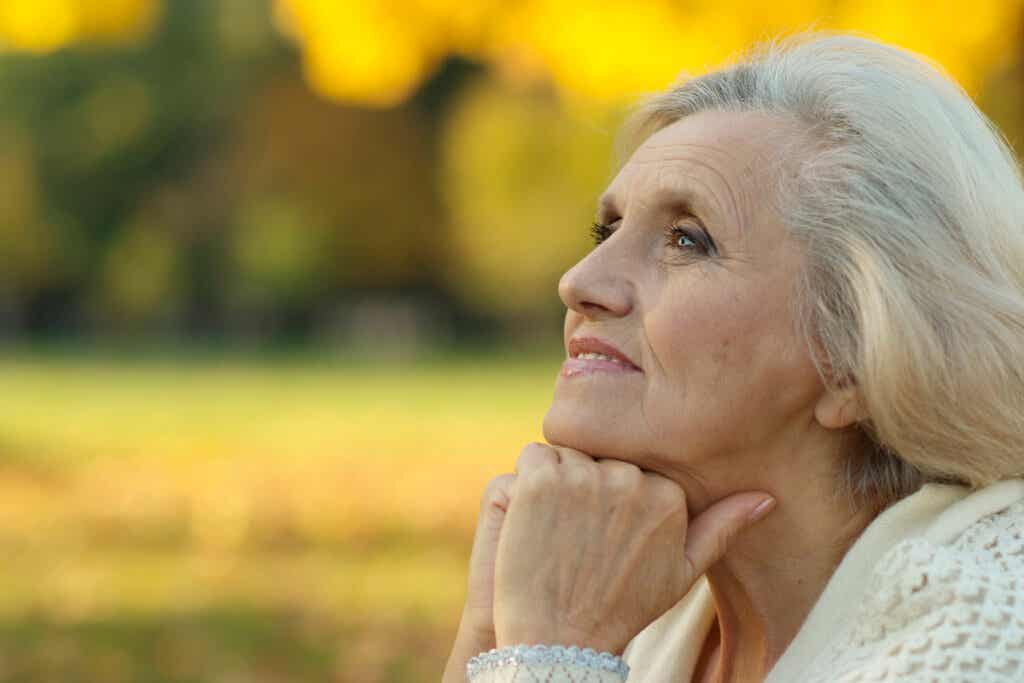 Elderly woman thinking about emotional distancing in the family