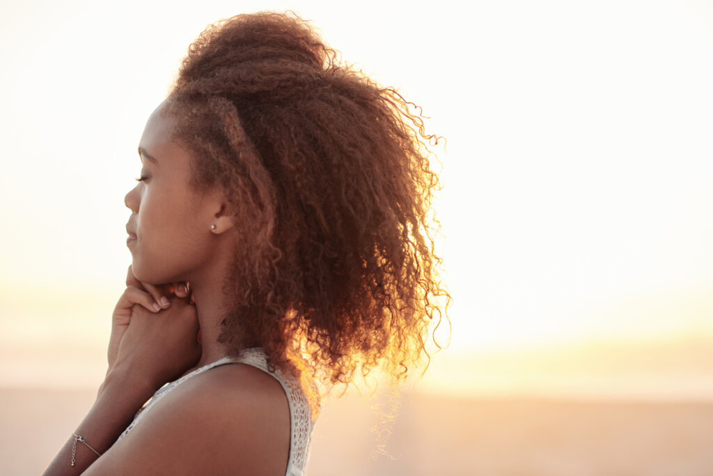 Woman thinking outdoors