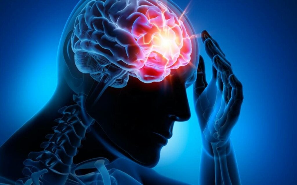 Persona con el cerebro iluminado simbolizando el efecto de la apraxia constructiva