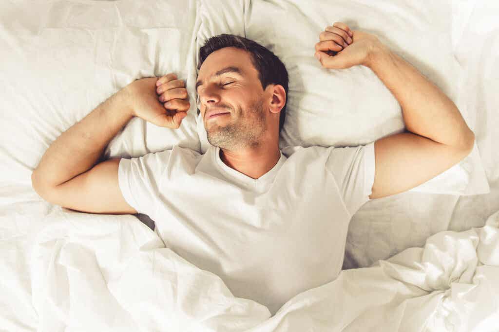 Man with clinomania in bed