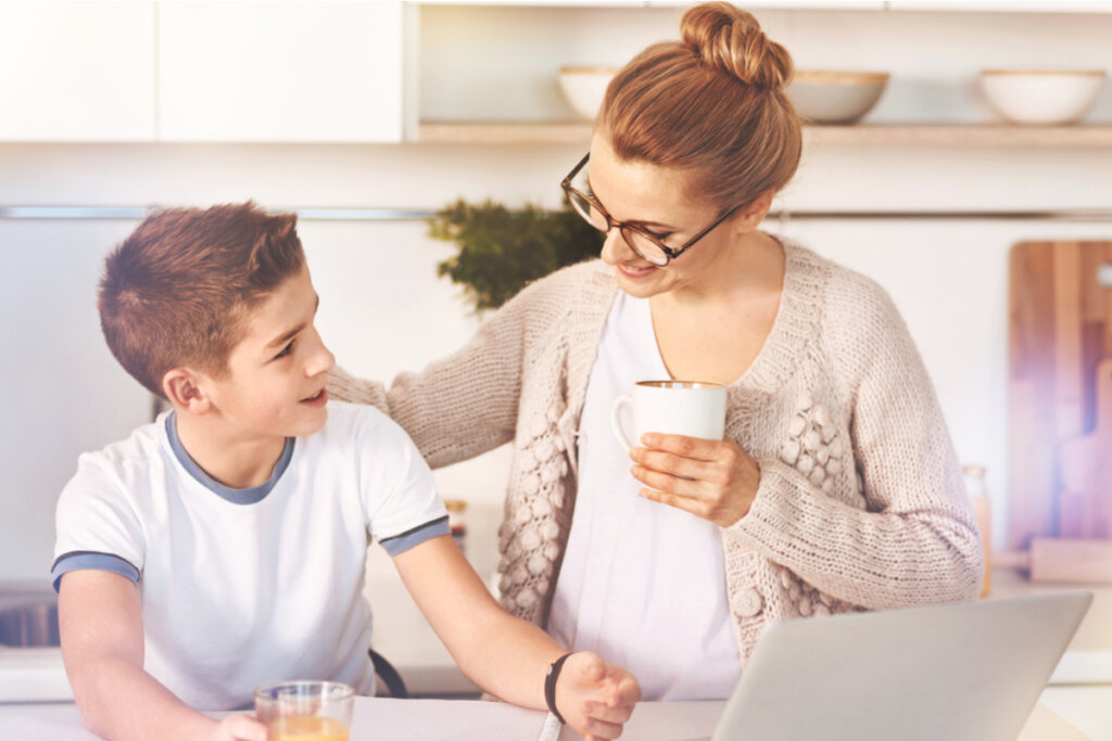 Mother talking to her son thinking about why we can't be friends with our children