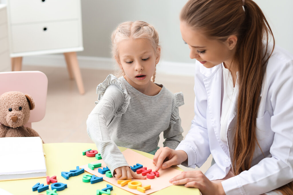 Little girl playing with her mother