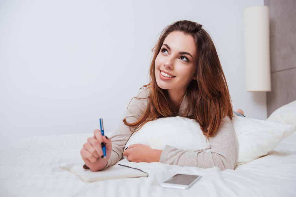 Woman writing before bed