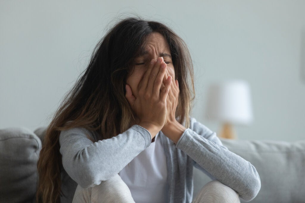 Crying woman feeling guilt