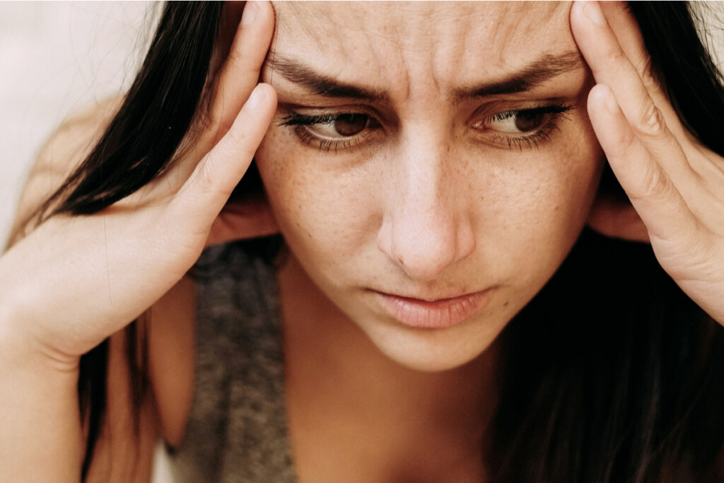 Woman overwhelmed with thoughts