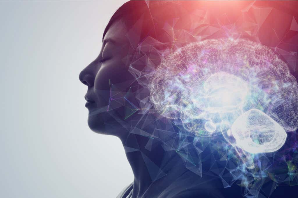 Woman with closed eyes with illuminated brain to symbolize people who enjoy pain