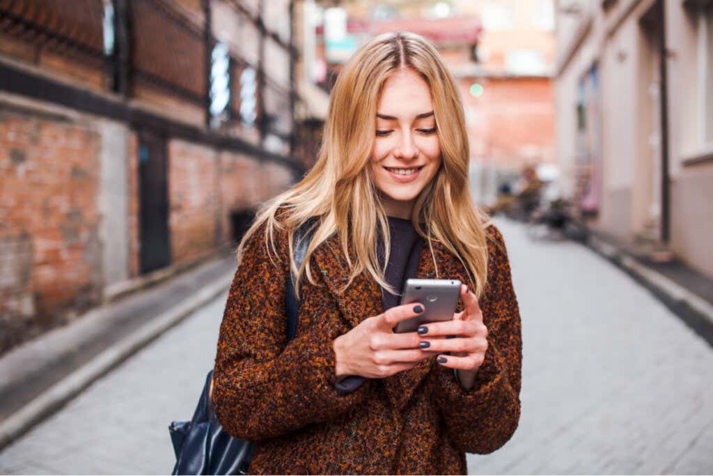Woman smiling with mobile