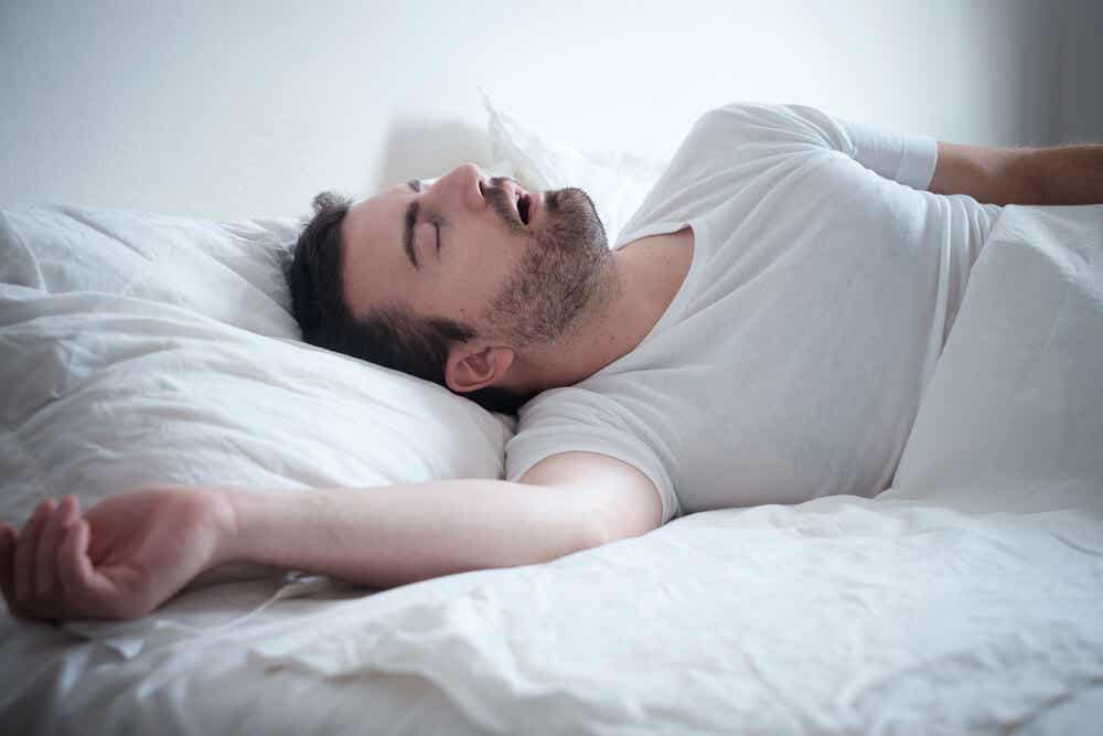 man suffering from the effect of sleeping with his mouth open