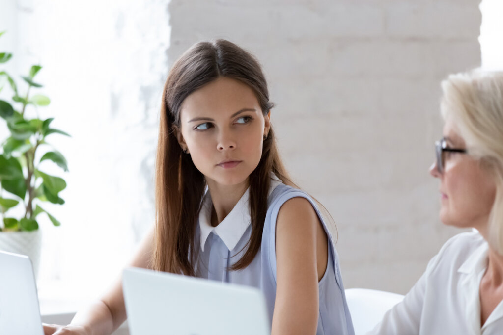 Woman glaring at a female colleague