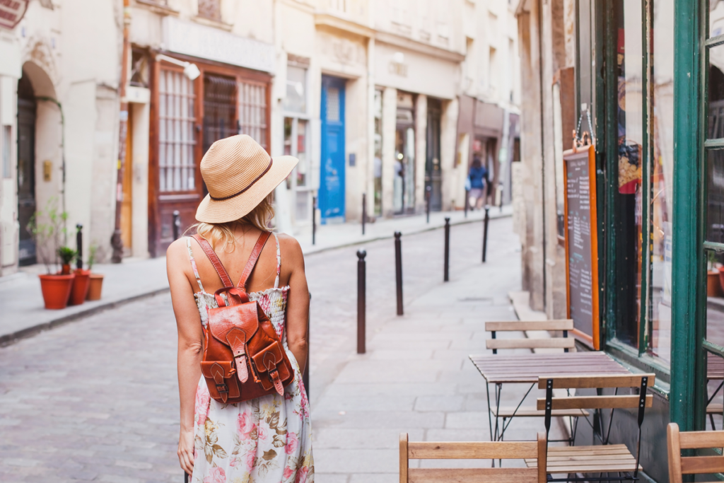 Woman walking through a city