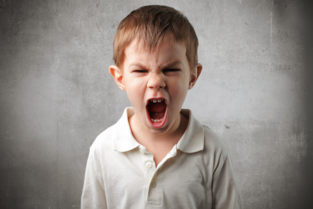 Angry child representing why laughter spreads only to some people