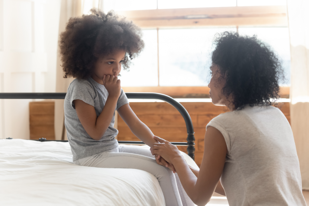 Mother talking to her daughter