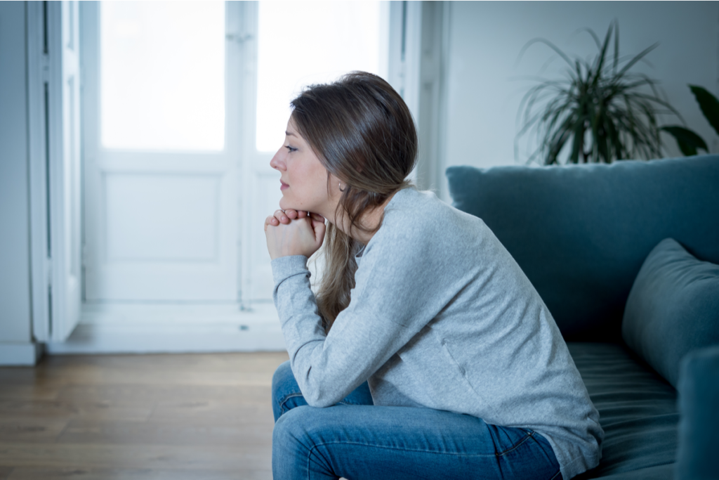 Sad woman in the living room