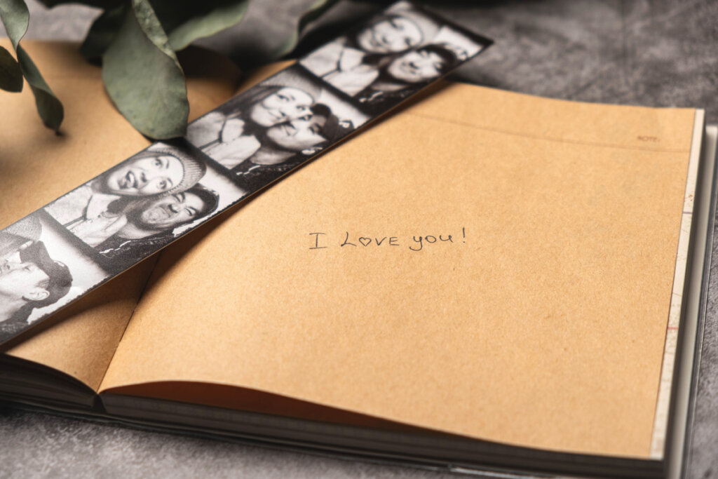 Photo of couple and a notebook