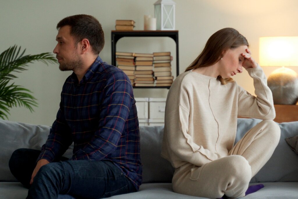 Couple turning their backs