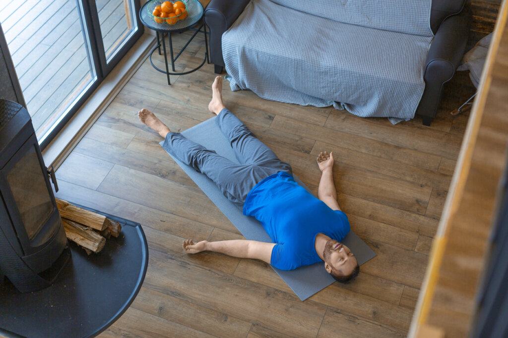 Lying man doing relaxation