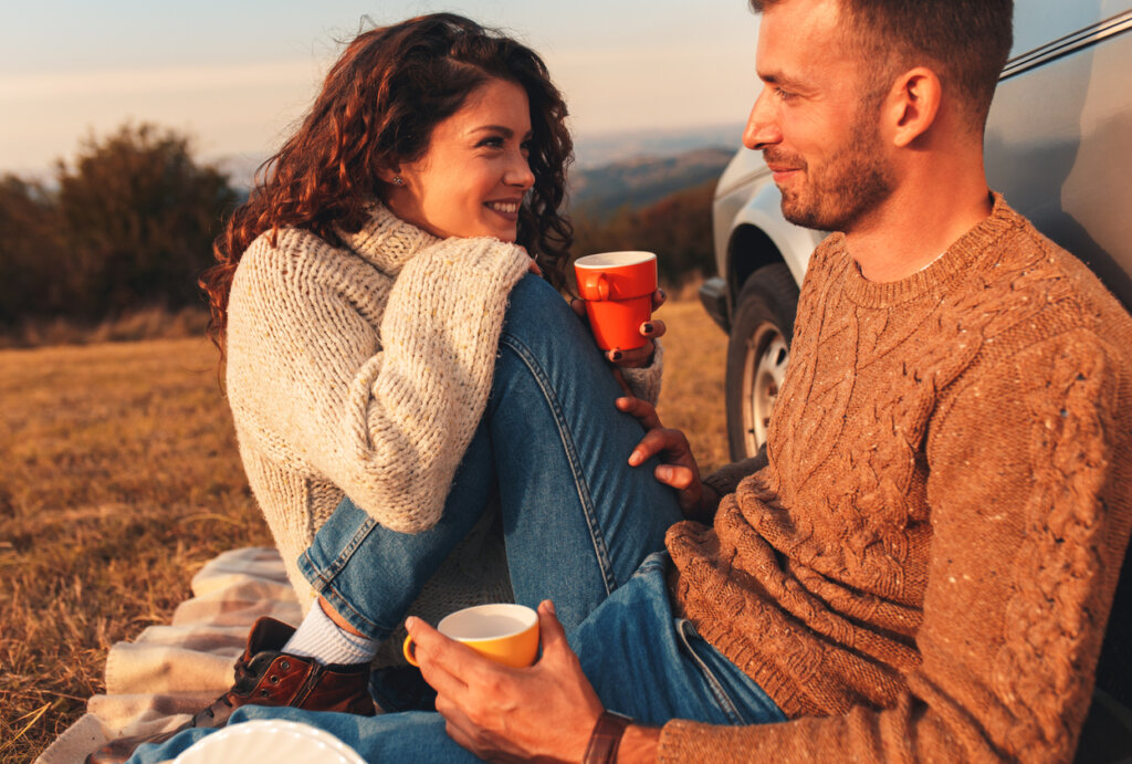 Happy couple looking at each other activating limbic resonance