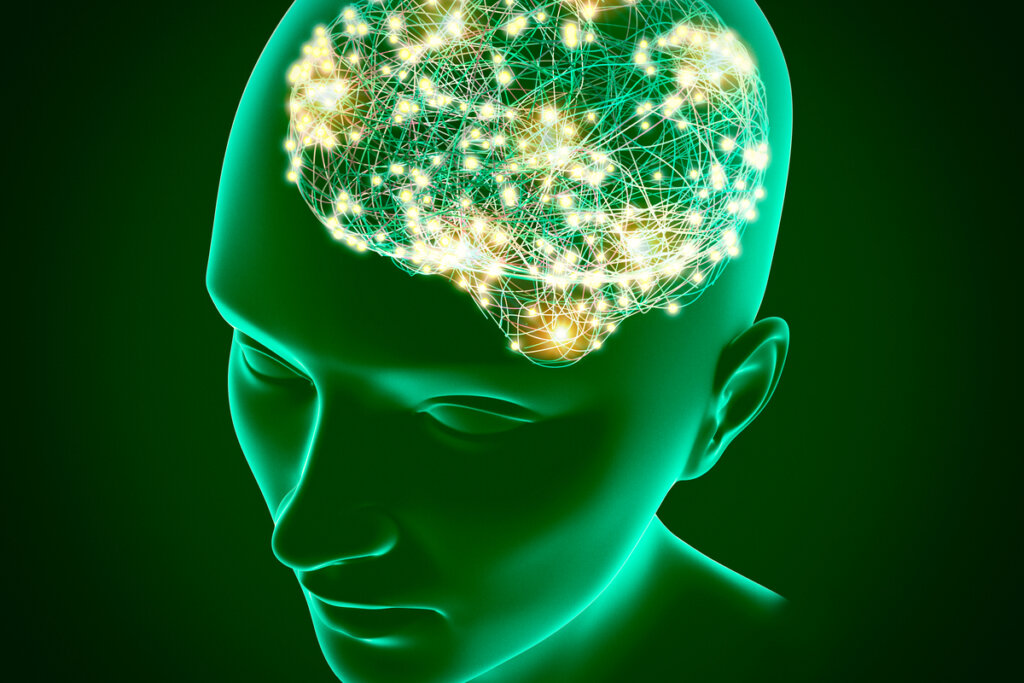 Cerebro iluminado simbolizando cómo los depresión nos impide creer en los comentarios positivos