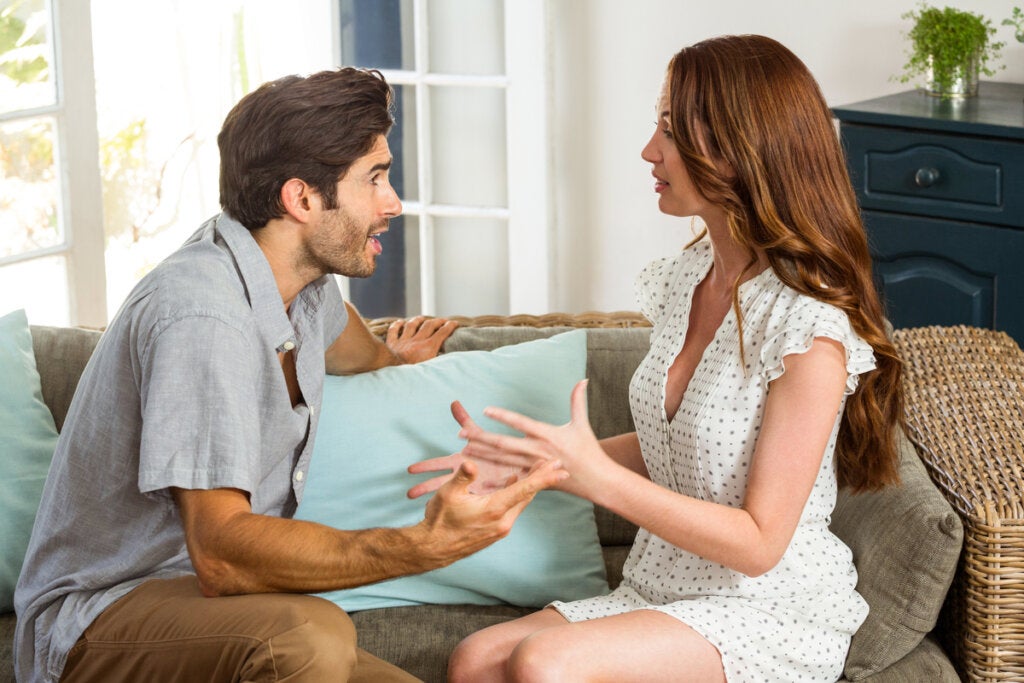 Couple arguing in living room