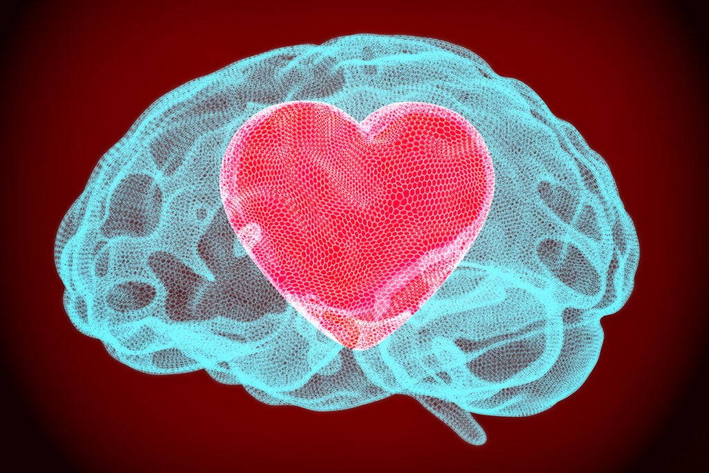 Brain with a heart symbolizing that if you are curious you will be happy