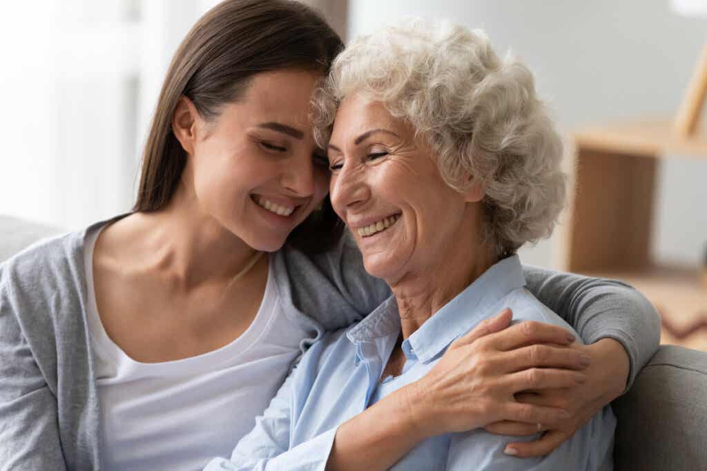 Girl hugging an older woman symbolizing the effect of the molecule that rejuvenates aging brains