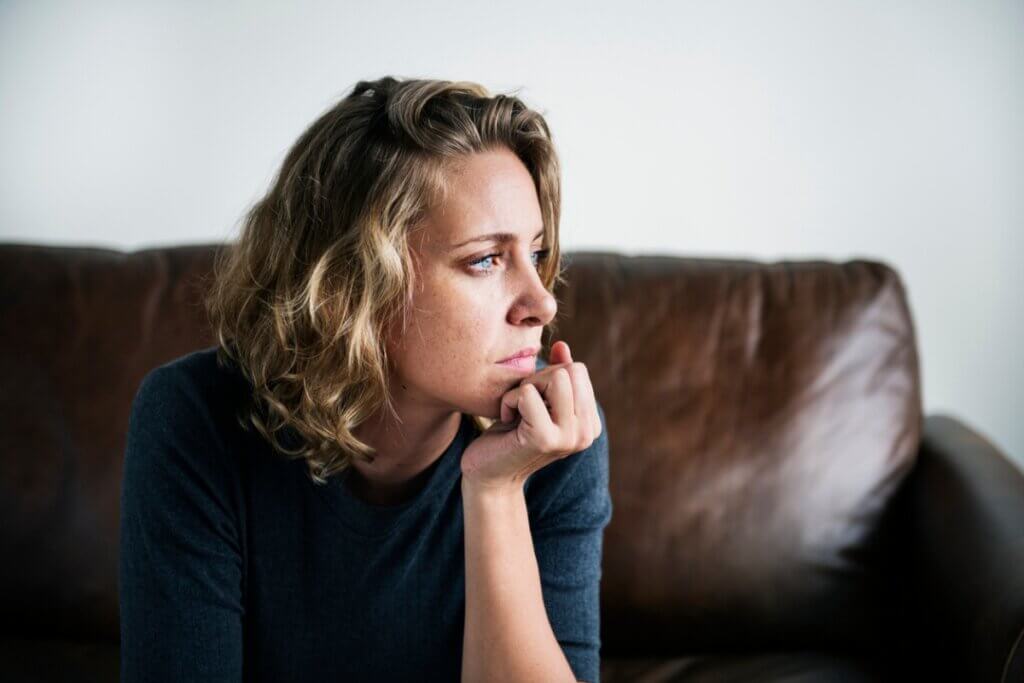 Worried woman, depicting egosyntonic and egodystonic behaviors.