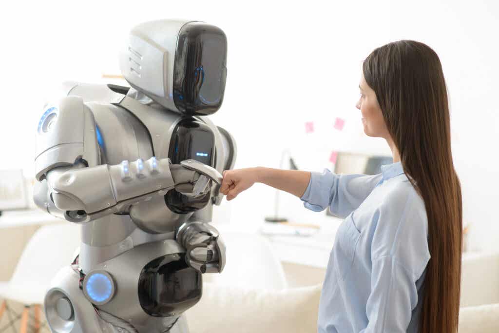 Robot che guarda una donna che simboleggia il "Grande Rimpiazzo"