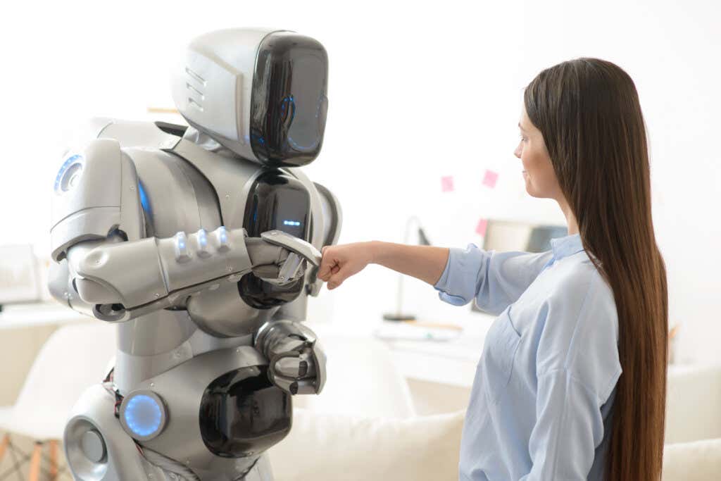 Robot looking at a woman symbolizing the "Great Replacement"