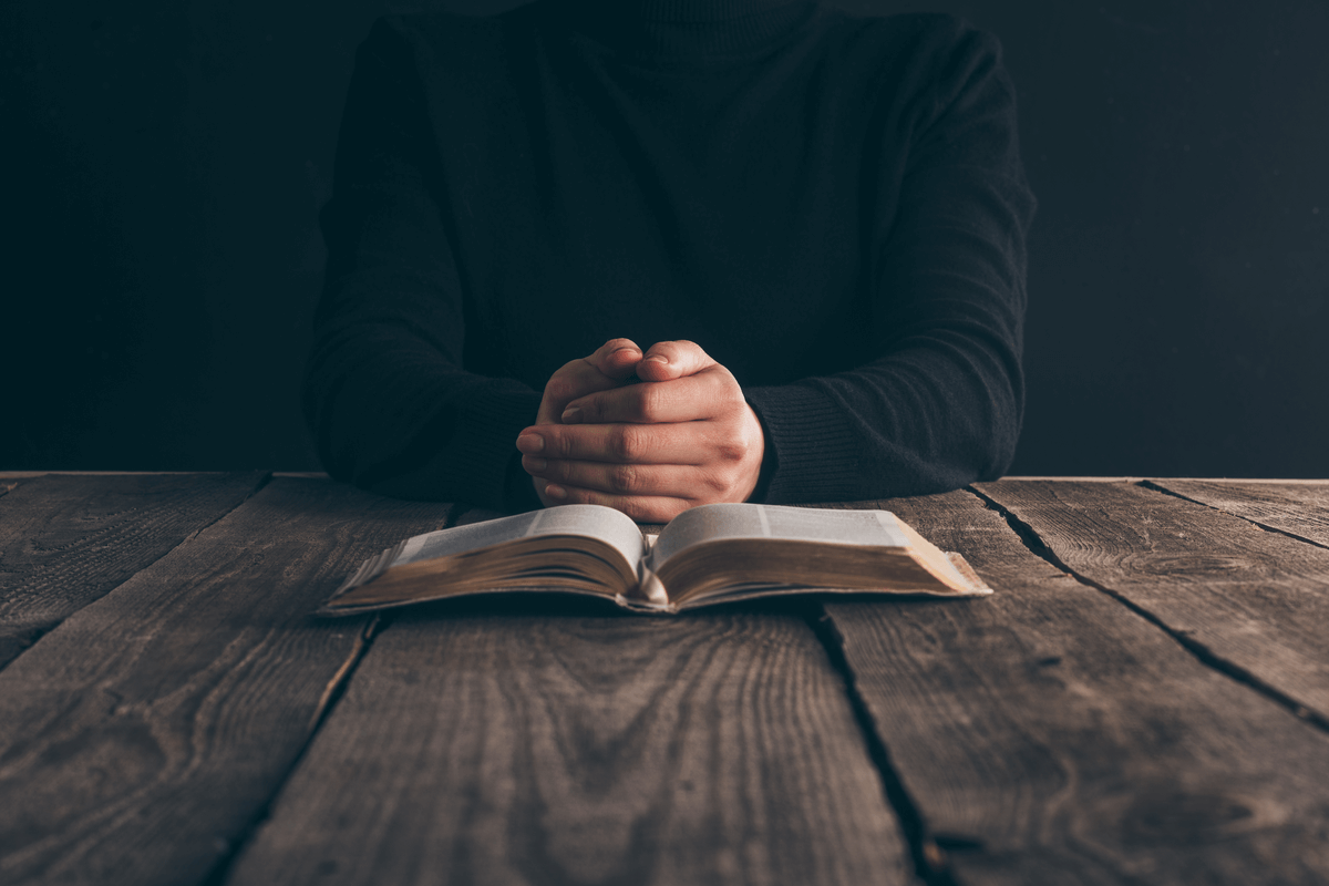 A man praying, depicting one of the facts about silence.