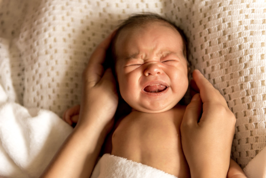 Baby crying, depicting the research to calm crying babies
