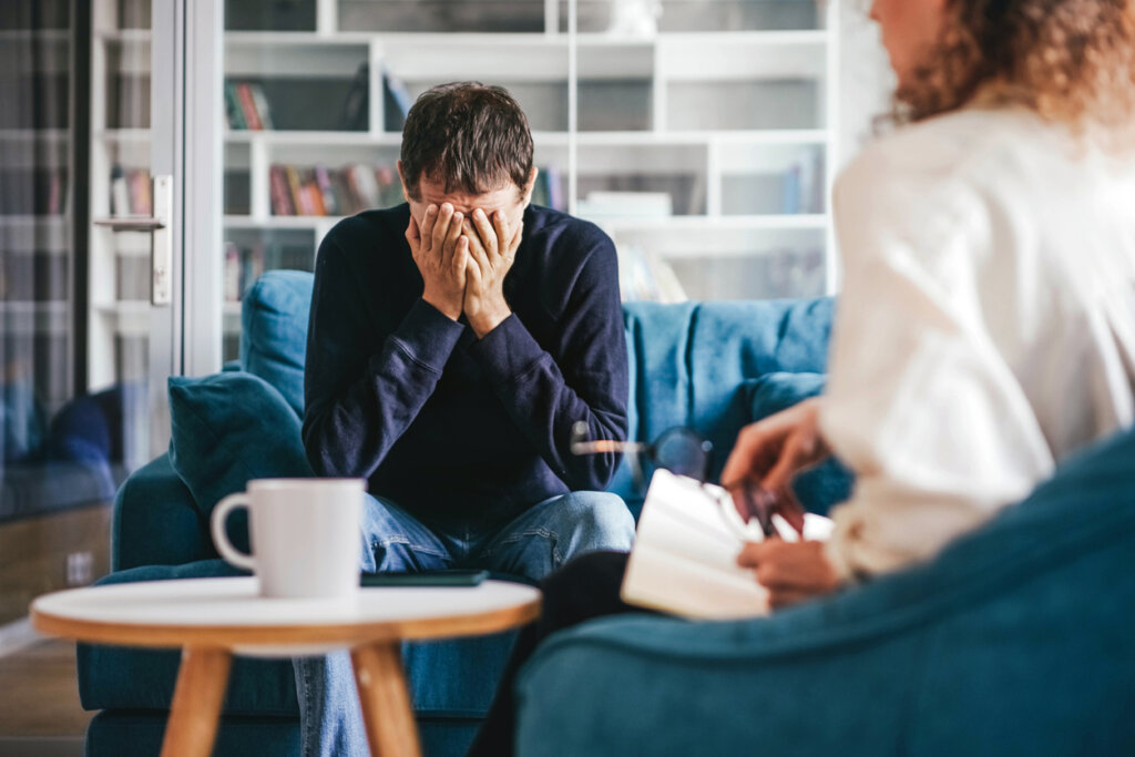 Man in therapy suffering from the effects of dopamine and schizophrenia