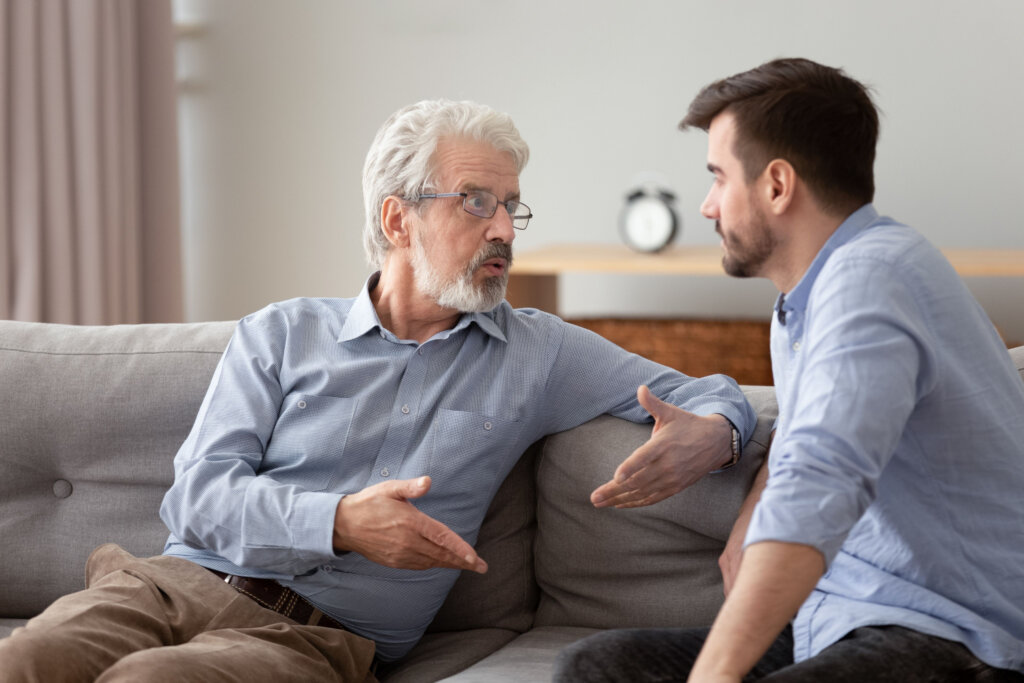 An father arguing with his adult son.