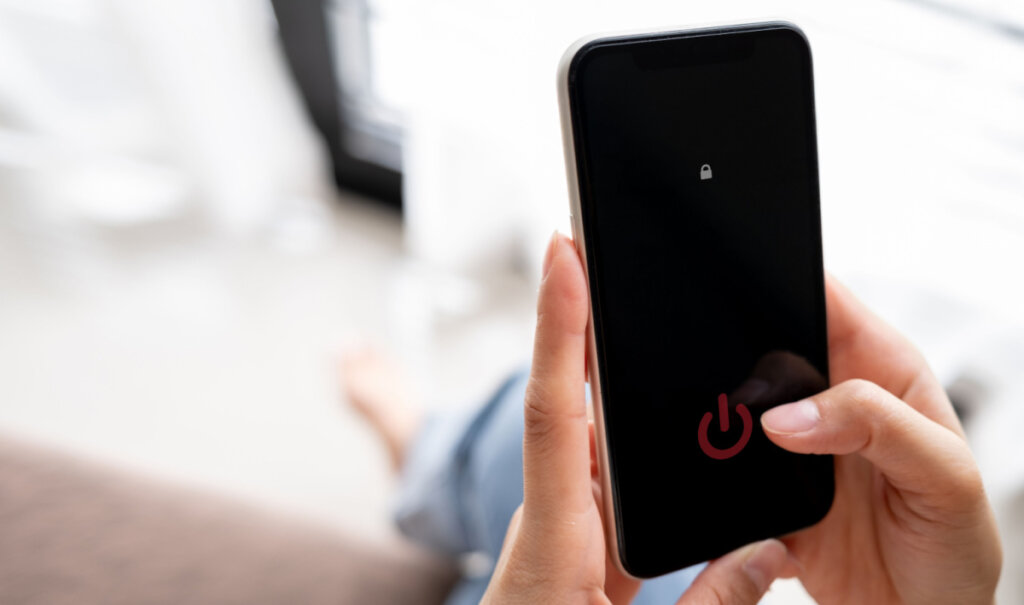 Woman turning off the mobile