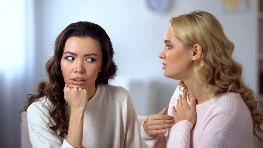 Pesky friend talking to another about contingent self-esteem