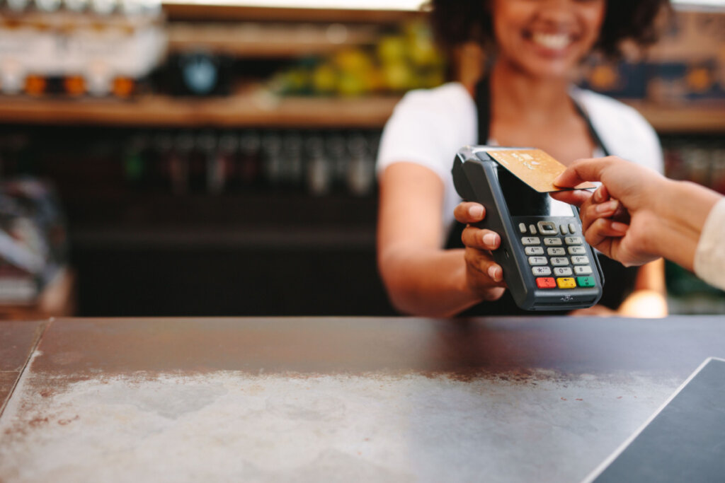 Woman paying with a card