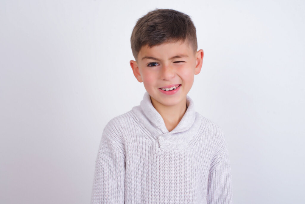 boy winking