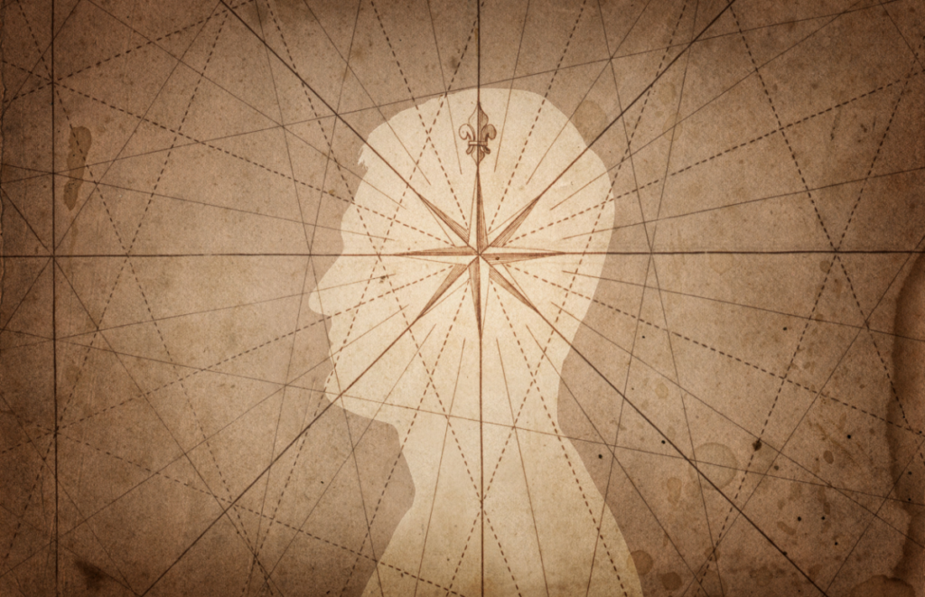 Silhouette of a man with a compass