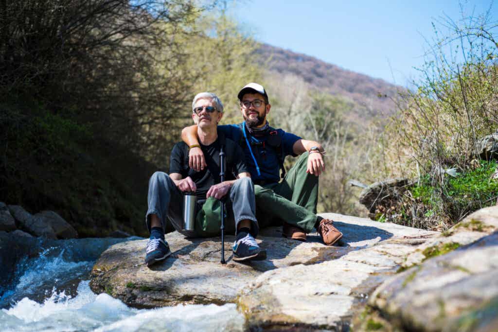 Father and adult son hiking