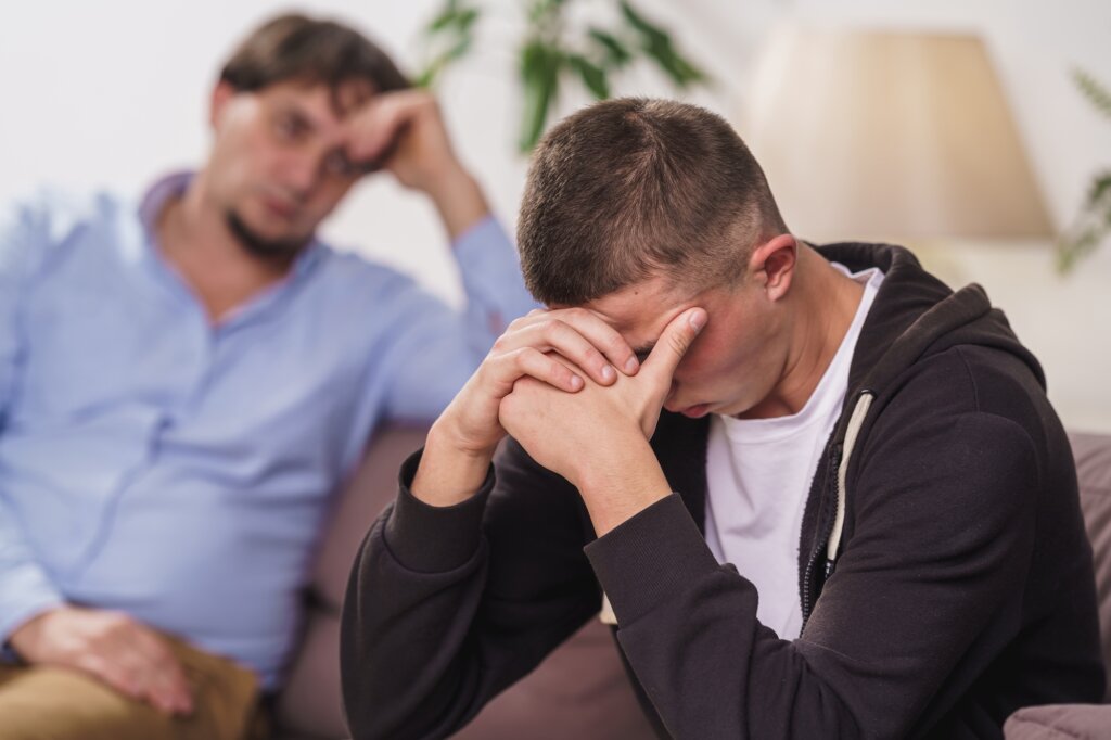 Teenager in conflict with his father