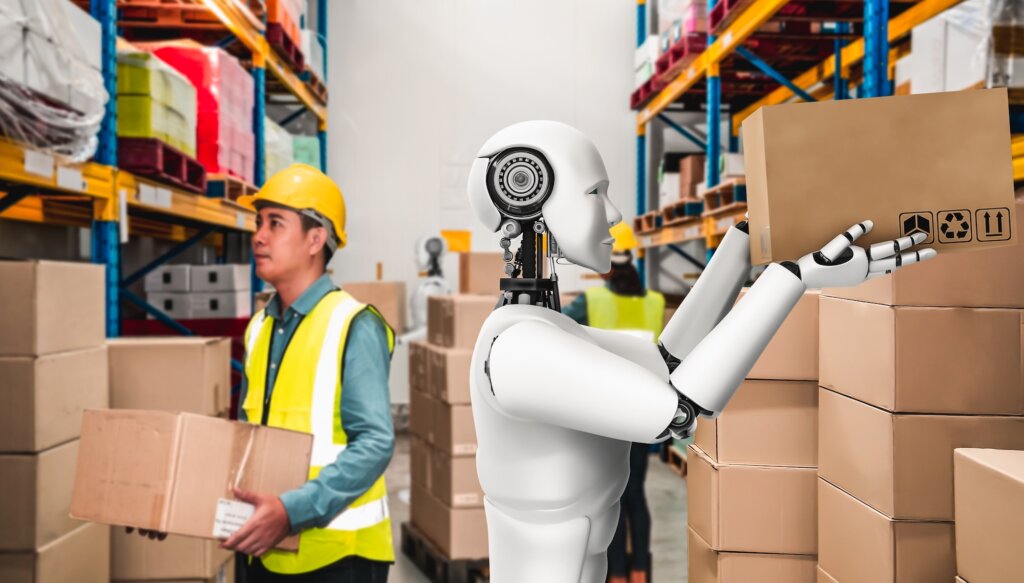 L'homme et le robot travaillent des caisses de levage