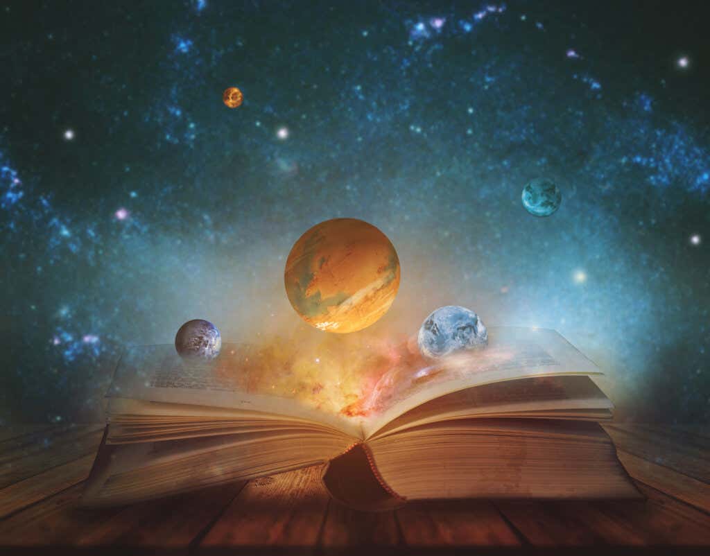 Öppen bok som lyser upp universum
