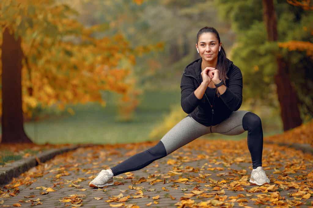 Woman exercises in the park