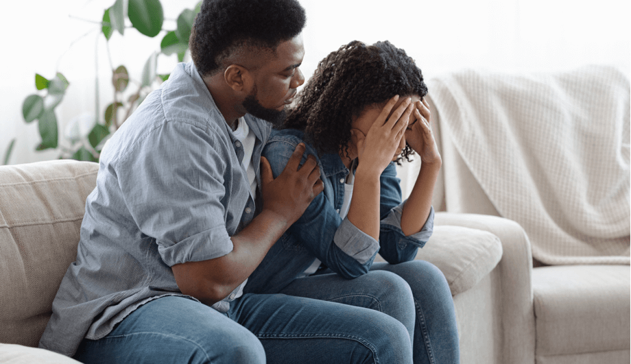 Man comforts a woman with emotional dependency