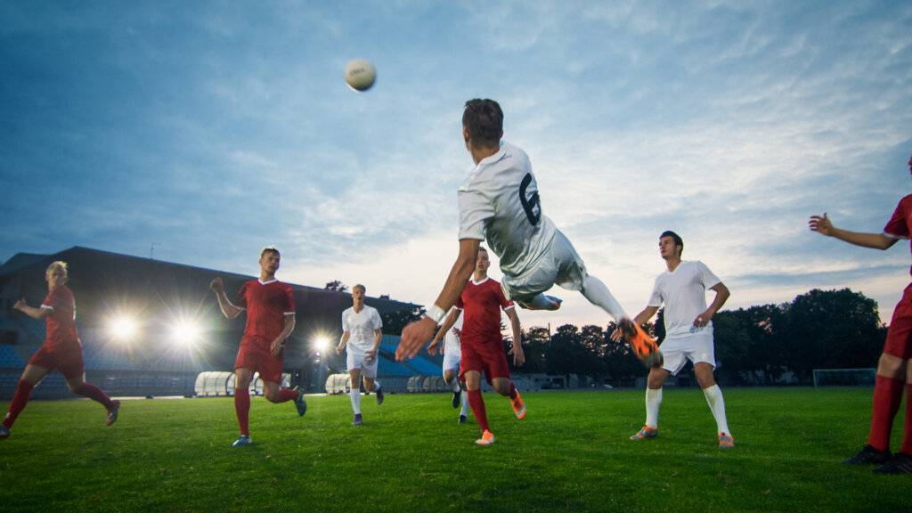 Joueurs de football symbolisant ce qui motive un athlète