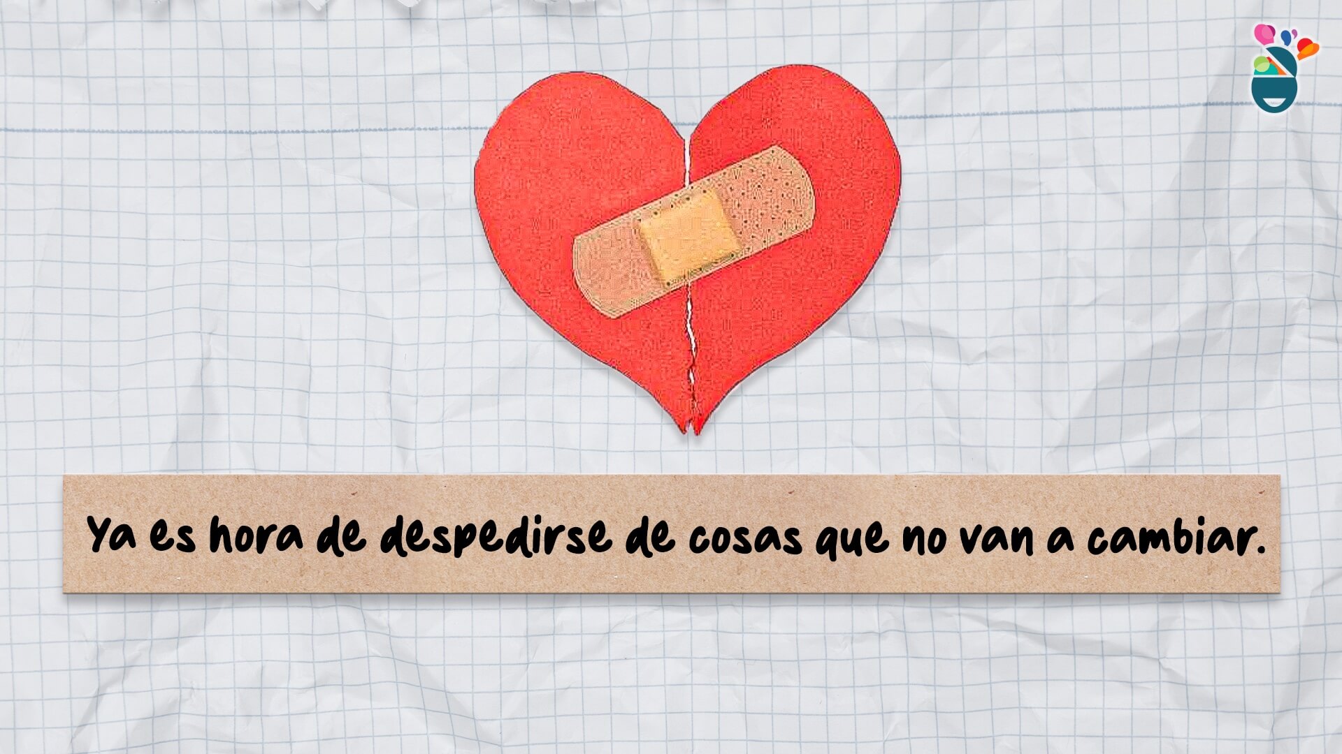 Corazón con curita sobre una hoja de papel cuadriculado y una indirecta de desamor